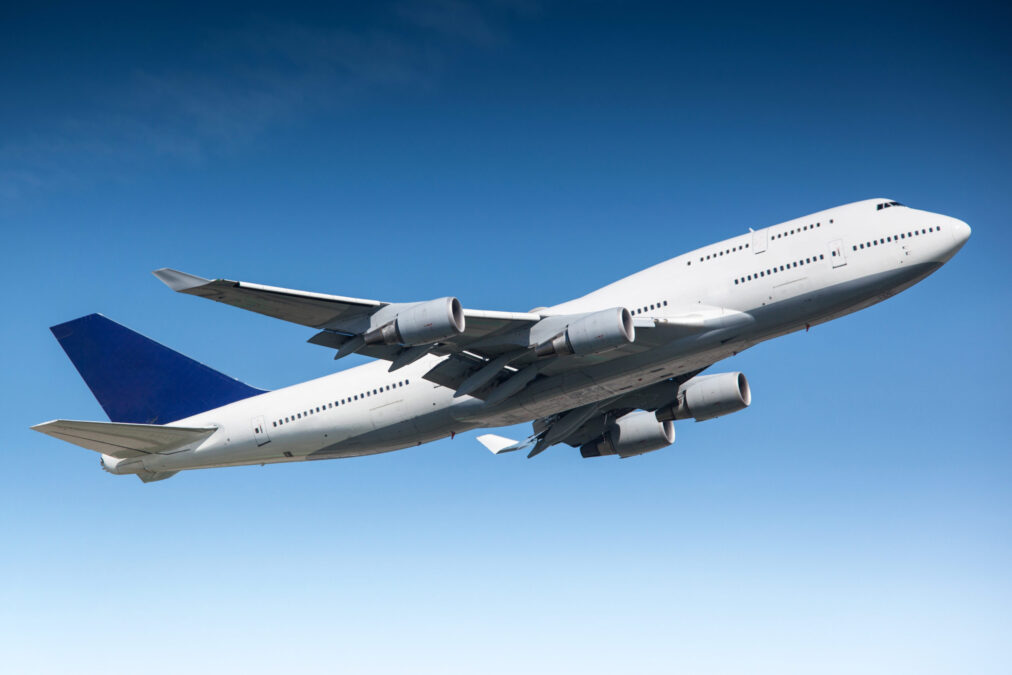 A large commercial airliner taking off.